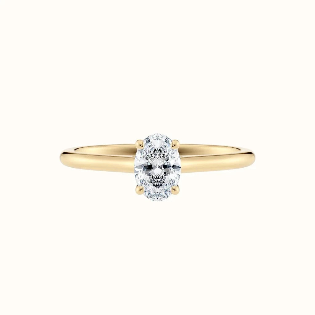 Forlovelsesring i gult gull tynn ring 0,50 Carat oval diamant, liggende sett rett forfra Sevendal 